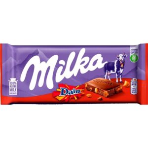 Шоколад молочный Милка DAIM с кусочками карамели 90г